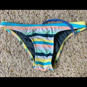 Jolyn swim suit bottoms size medium Brazil cut